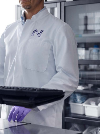 Nightingale Health laboratory specialist working on a computer.