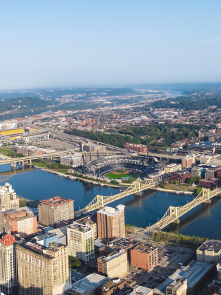 Aerial view of downtown Pittsburgh and the confluence of its rivers, photograph.