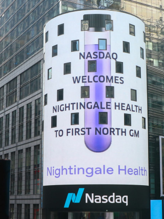 Nightingale Health featured on the Nasdaq MarketSite billboard celebrating its First North listing, photograph.