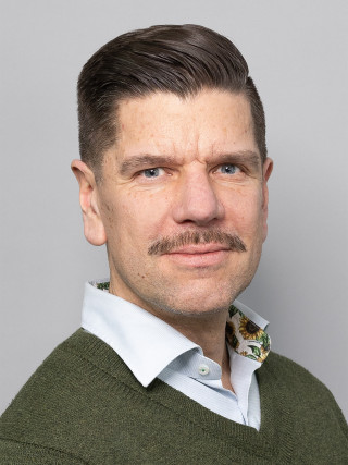 Photograph of Kimmo Aro.